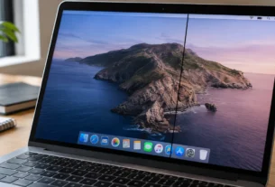 MacBook screen showing a visible black vertical line defect