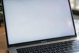 MacBook screen showing white tint issue